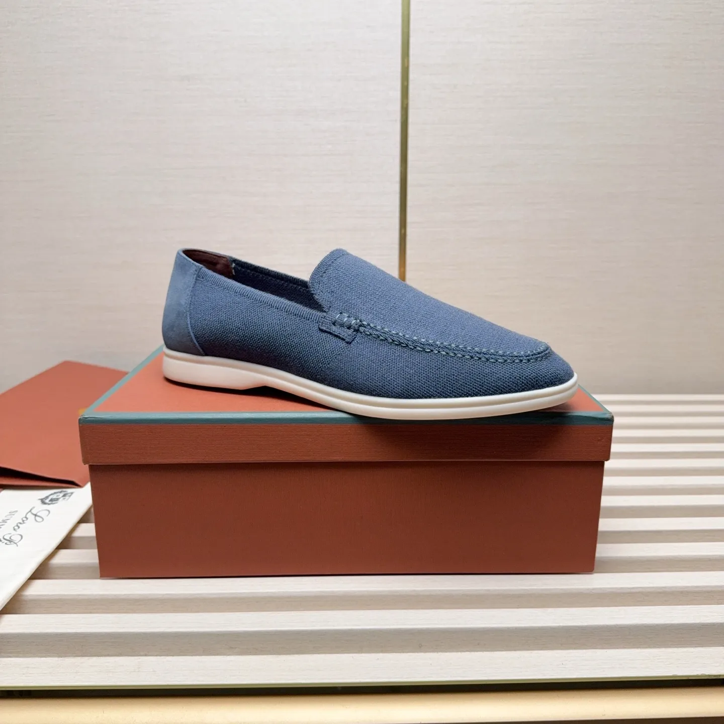 Men's Men's Shoes 💰400 Loro PIana moccasins are made of wish wool fabric. The upper is made of knitted fabric, made on a loom, and then attached to a rubber sole. The Rain System's water-repellent treatment enhances the shoe's functional design, while the suede details give the shoe a sense of elegance and sophistication. Made from Wish, fine wool from Australian and New Zealand Merino sheep